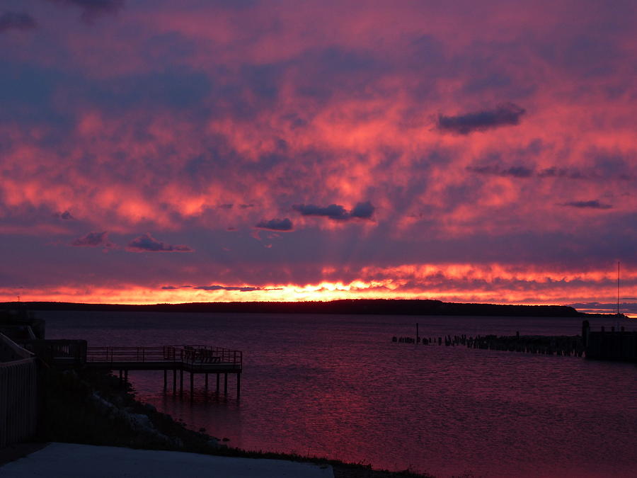 Sunrise over Mackinac Island, photograph by Robert McGreevy